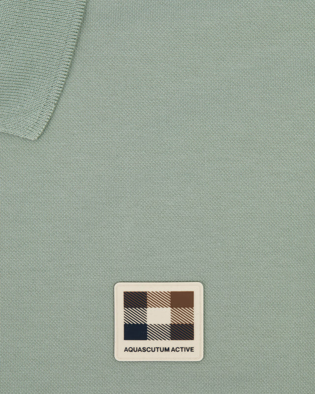 STRETCH PIQUET BADGE POLO
